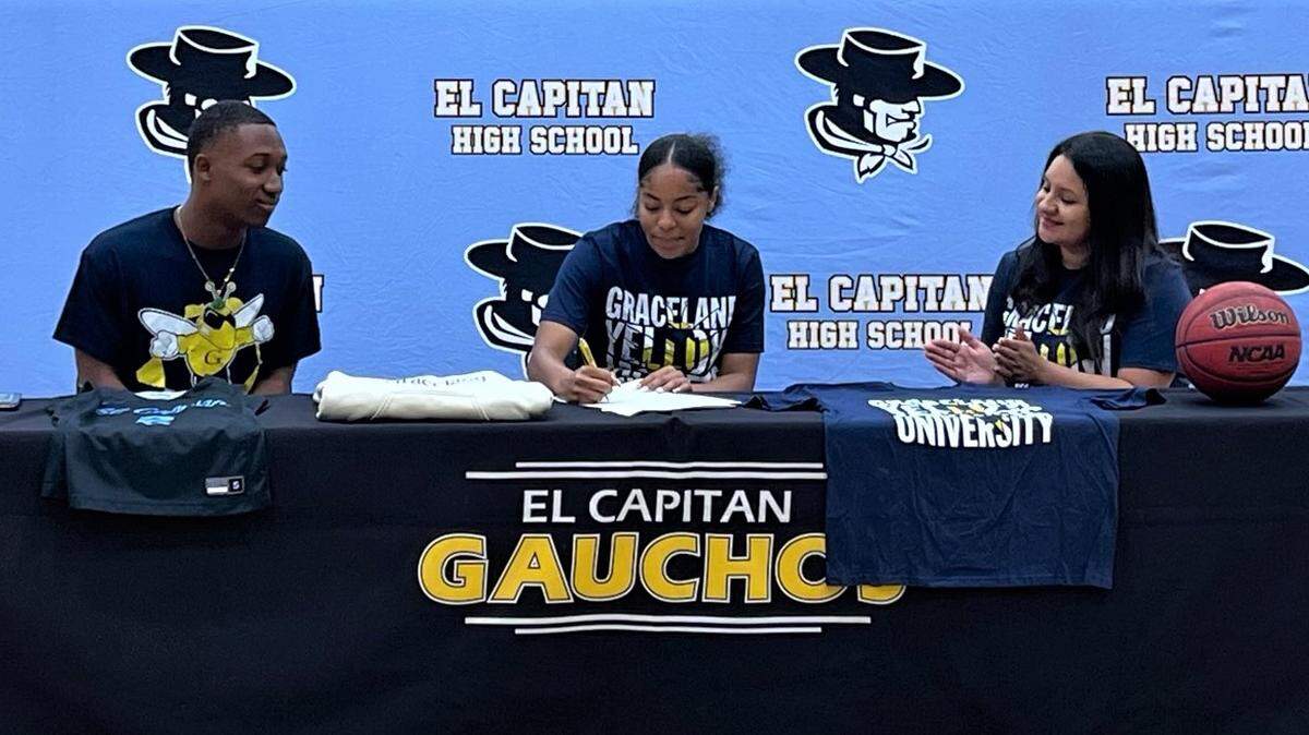 El Capitan High School senior Emma Ramey signed her national letter of intent to accept a basketball scholarship to Graceland University in Iowa while her boyfriend Jahkylle Smith and mother Lupe Ramirez look on during a ceremony at the high school on Tuesday, May 30, 2023.