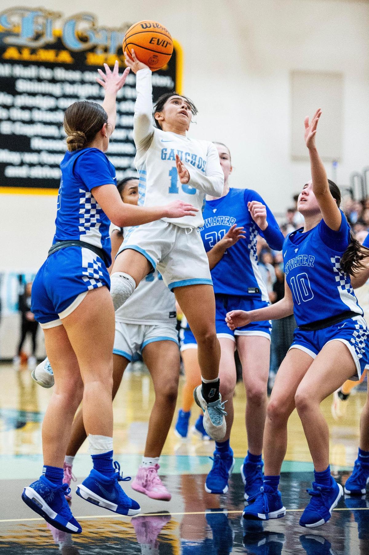 El Capitan senior Shantelle Magana (13) attempts a layup during a game against Atwater at El Capitan High School in Merced, Calif., on Thursday, Feb. 6, 2025. The Gauchos beat the Falcons 57-47.