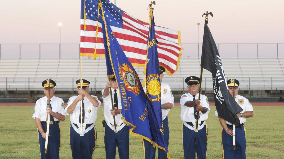 Members off the Los Banos VFW and American Legion post the colors July 4, 2014 at Veteran’s Memorial Stadium at Pacheco High School in Los Banos. Although this year most public Fourth of July celebrations have been canceled, patriotic Los Banos residents will find creative ways to recognize the nation’s birth.
