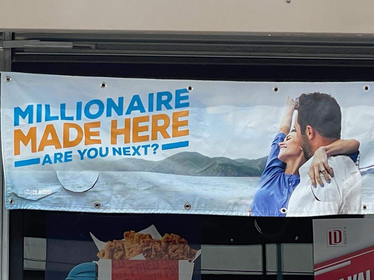 A signing hangs in front of Shannon’s Mini Mart in Atwater, CA after lucky customer recently won $10 million on a California scratch-off ticket on Feb. 13, 2025.