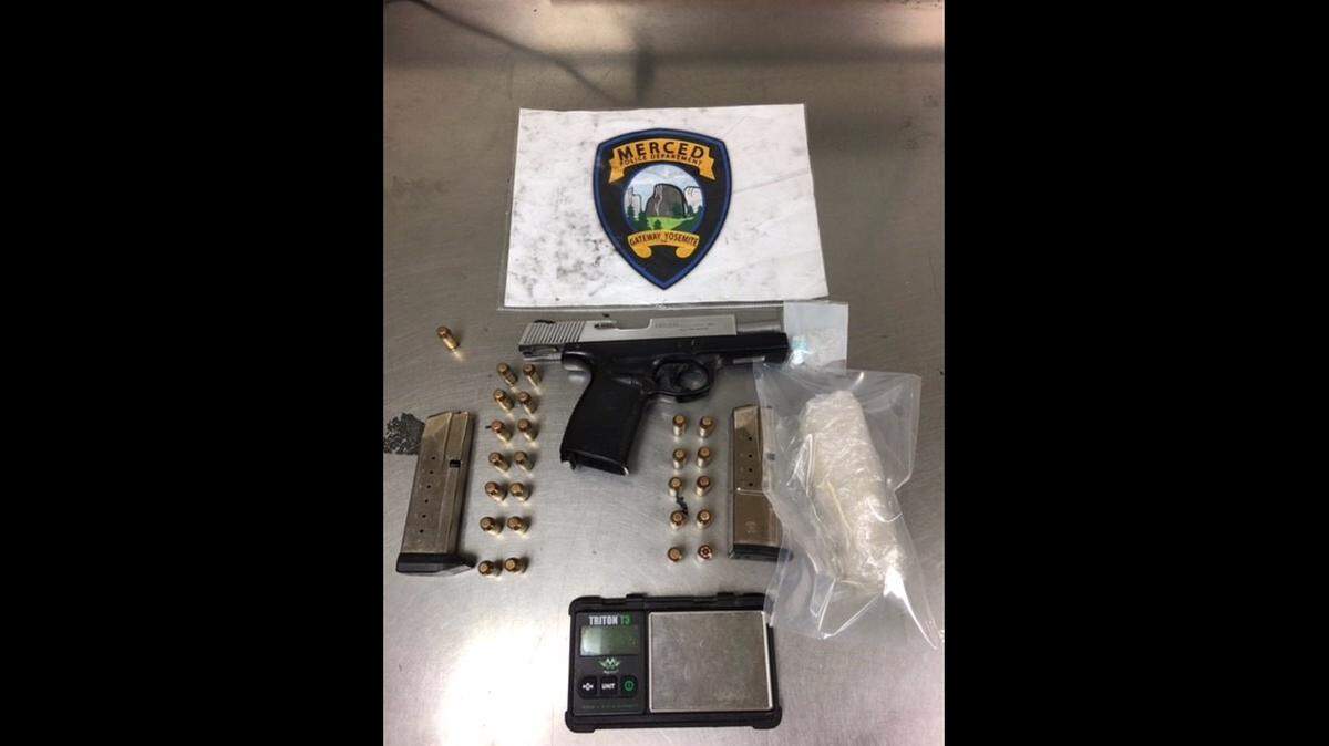 Police officers arrested a 40-year old known gang member after they allegedly found he was in possession a stolen handgun and narcotics after a traffic stop in Merced on Wednesday.