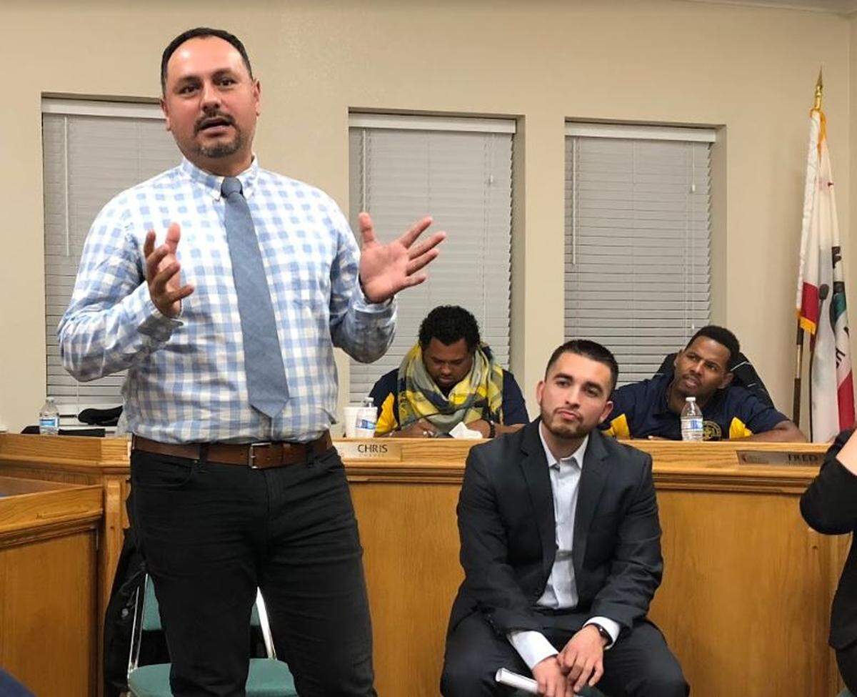Angel Barragan, a pastor and dean of students, is one of four contenders for district 2.