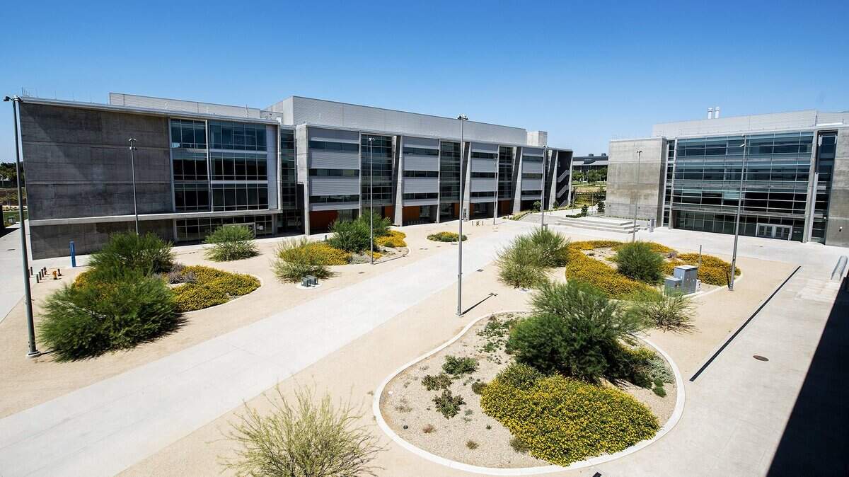 The Academic Quad, center, with the Sustainable Research and Engineering Building, left, and Biomedical Sciences and Physics Building, right, on the University of California, Merced campus in Merced, Calif., on Thursday, Aug. 6, 2020.