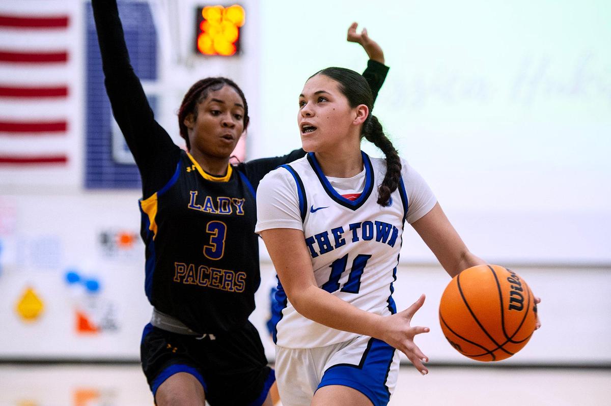Atwater junior Natalia Melgoza (11) drives to the basket during a game against Grant at Atwater High School in Atwater, Calif., on Tuesday, Feb. 25, 2025. The Falcons beat the Pacers 70-54.