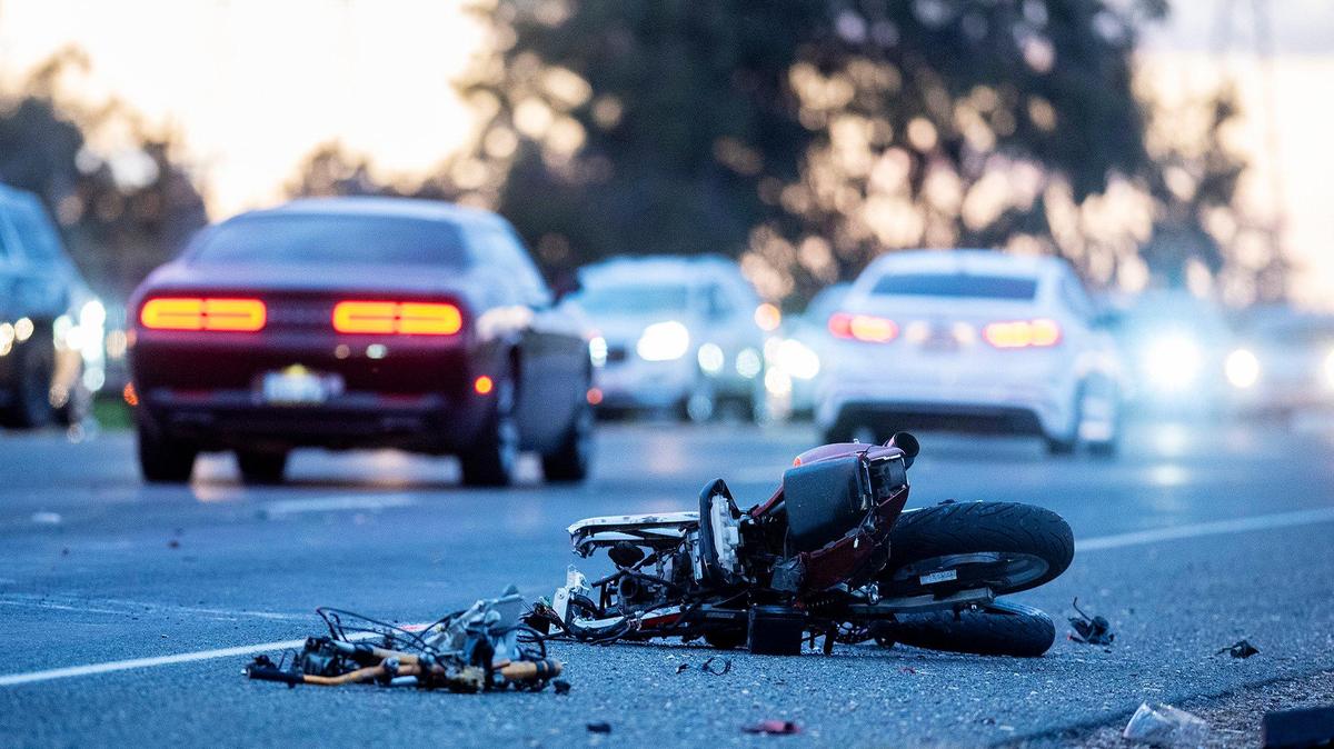 The California Highway Patrol investigates the scene of a collision involving a motorcycle and an SUV near Santa Fe Drive and West Avenue Two just outside Atwater, Calif., on Monday, Feb. 21, 2022. According to the CHP, the motorcycle rider was taken to a hospital with major injuries.
