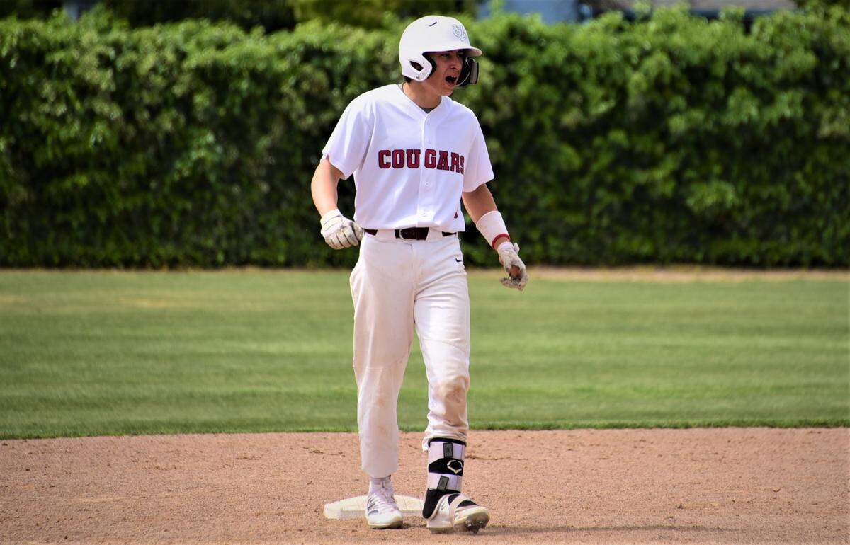 Golden Valley sophomore Austin Mello reacts after driving in two runs with a double during the fifth inning of an 8-7 win over Livingston during on Monday, April 18, 2022 at Memorial Ballpark in Atwater, Calif.