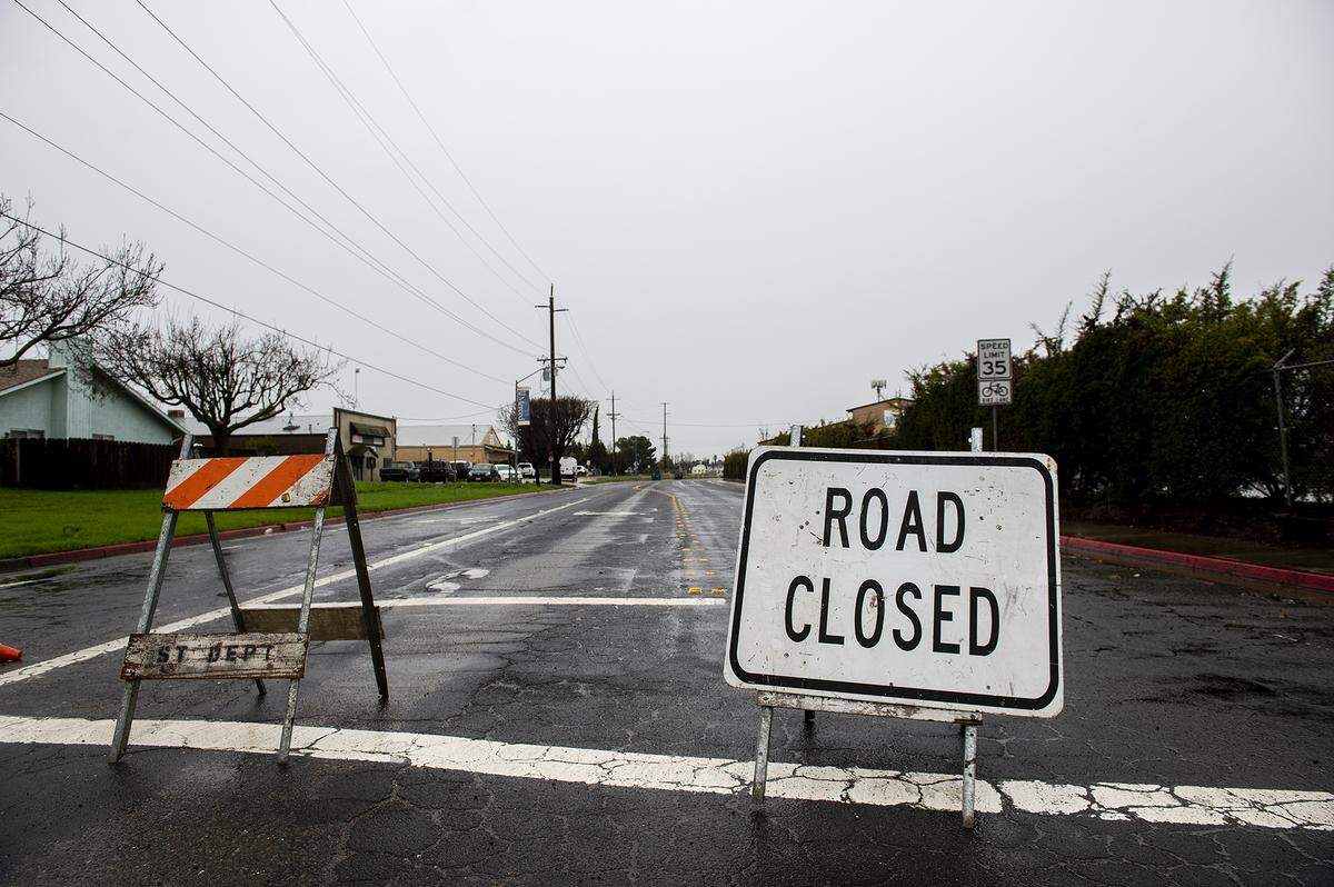 A section of Childs Avenue between G Street and Highway 59 is closed due to flooding in Merced, Calif., on Monday, Jan. 9, 2023.