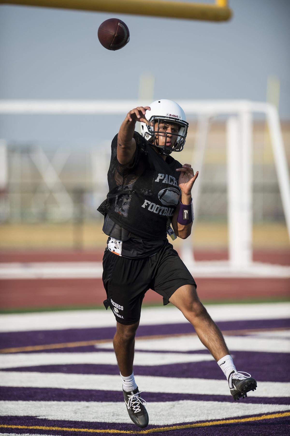 Quarterback Marcus Ordunez throws a pass during football practice at Pacheco High School in Los Banos, Calif., on Thursday, July 26, 2018.  Ordunez acccounted four touchdowns against Lathrop and was voted by the fans as the Merced Sun-Star Football Player of the Week for the Sept. 21 games.