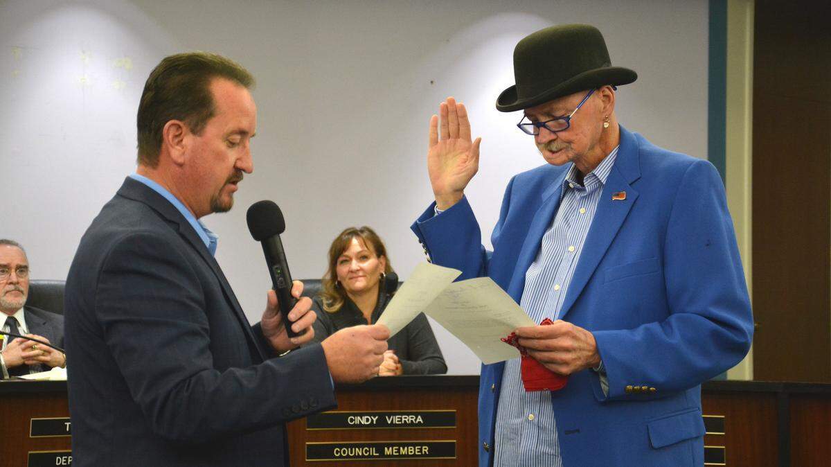 Appointed Atwater City Councilman John Cale is sworn in by Mayor Paul Creighton Thursday, Dec. 20, 2018, during a special city council meeting.