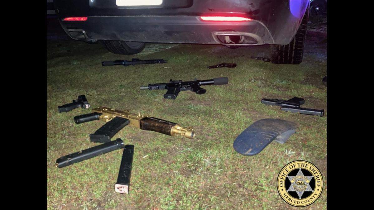 Merced County Sheriff’s Deputies responded to a possible kidnapping in Merced on Friday, Dec. 23, 2022 and located five subjects, armed with handguns and rifles, hiding near and under a parked car on the property. Deputies located three rifles, four handguns, and hundreds of rounds of ammunition with high-capacity magazines. 