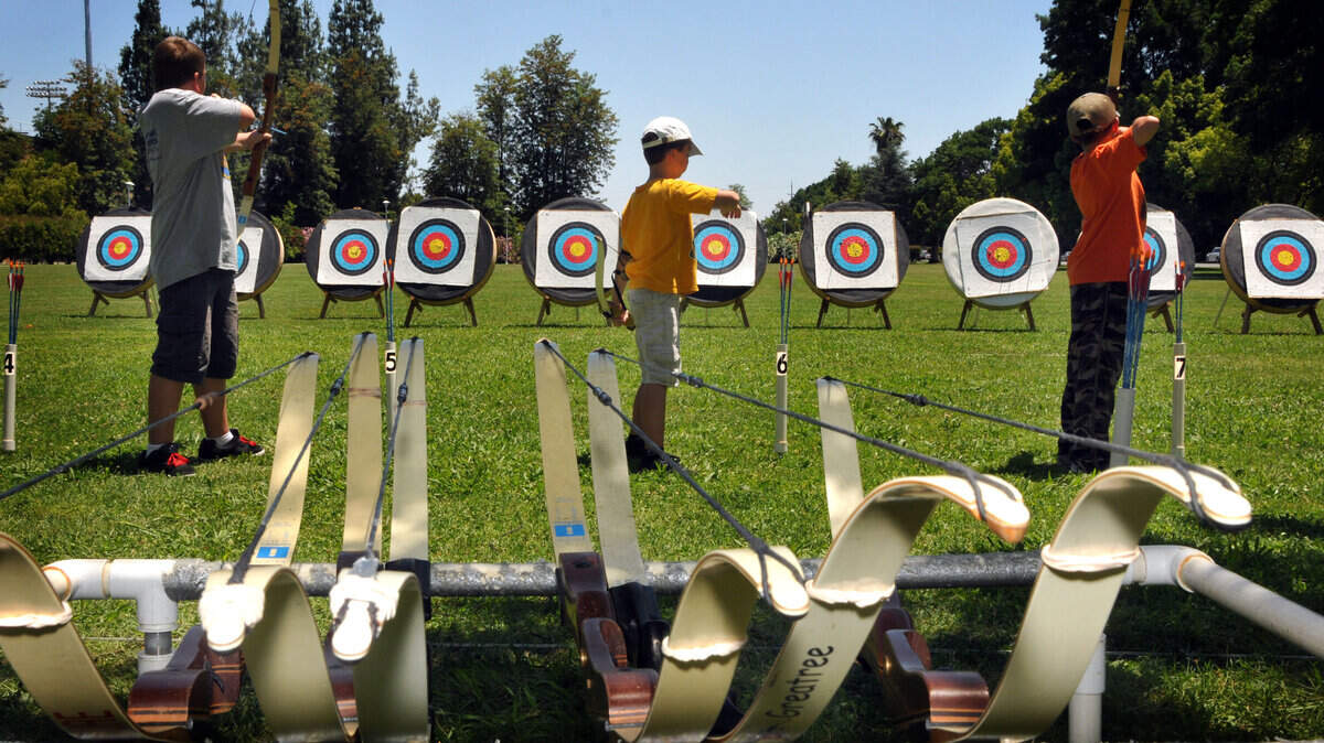 Archery students from 8-14 years-old take aim at the targets during the 2011 “College for Kids” at Merced College, on Tuesday June 21, 2011.