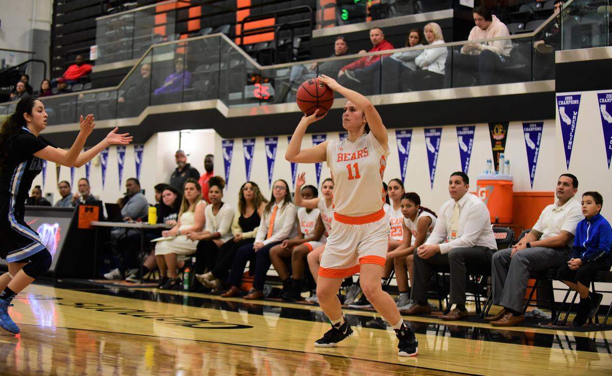 Merced High senior Kaitlynn Perez shoots a 3-pointer during a game against El Capitan on Thursday, Jan. 30, 2020. Perez finished with eight points, 12 rebounds and seven steals during an overtime win over the Gauchos.