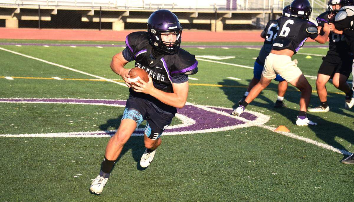 Pacheco High quarterback Aidan Pikas scrambles during practice on Thursday, Aug. 1, 2024.