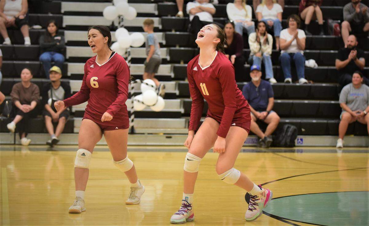 Golden Valley’s Lauren Gonzales (11) and Bree Barner (6) celebrate a point during a match against El Capitan on Wednesday, Sept. 21, 2022.