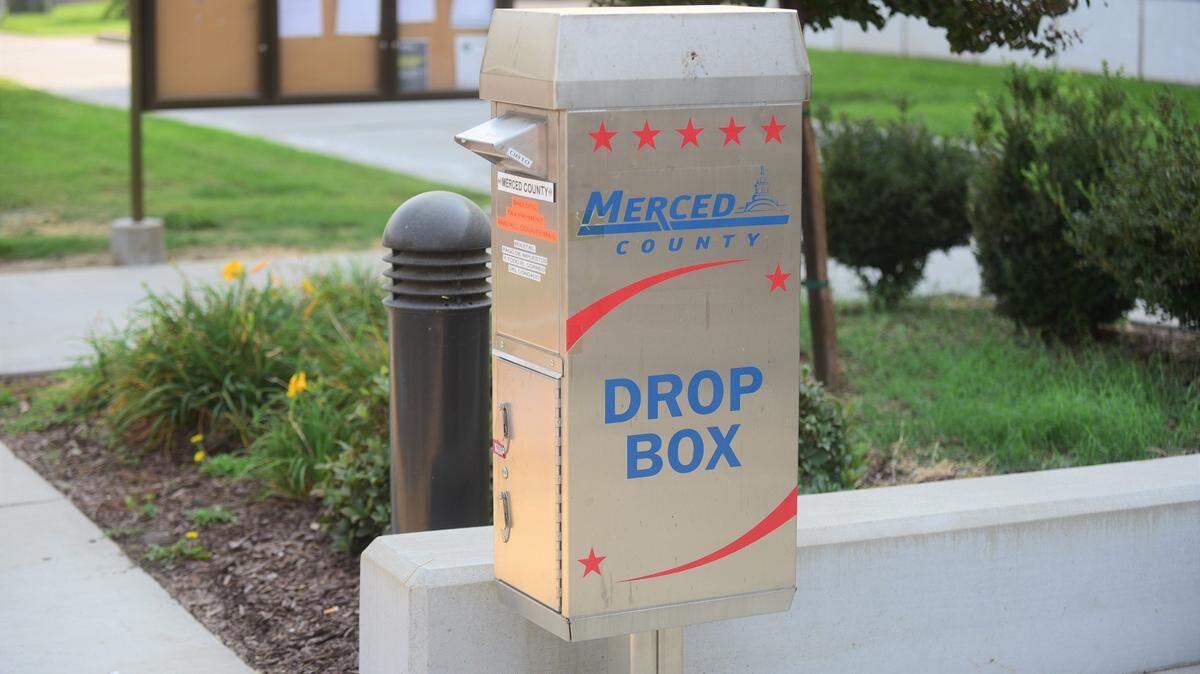 The Merced County Registrar Office is asking voters if they are dropping off their mail ballots to make sure they dropping them off at offical drop boxes like this one posted outside the Administration Building on M Street in Merced.