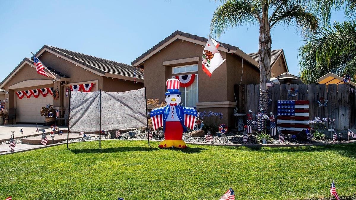 Independence Day decorations outside a home in the 1800 block or White Pines Court in Atwater, Calif., on Thursday, July 2, 2020.