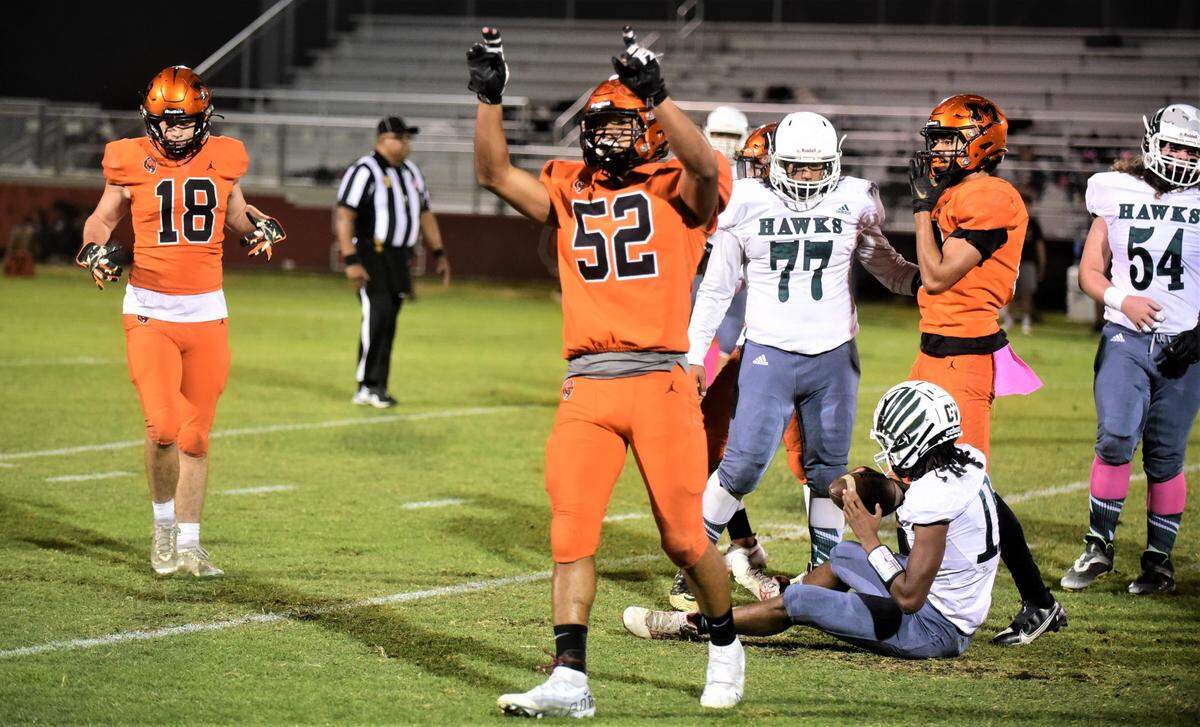 Merced High School junior Jalonn Booth records one of his two sacks during a 56-14 win over Central Valley on Fridya, Oct. 21, 2022 at Cathie Hostetler Stadium at Merced High School.