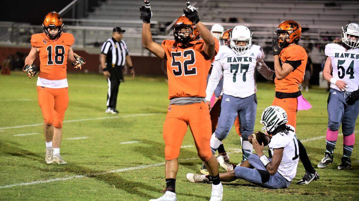 Merced High School junior Jalonn Booth records one of his two sacks during a 56-14 win over Central Valley on Fridya, Oct. 21, 2022 at Cathie Hostetler Stadium at Merced High School.