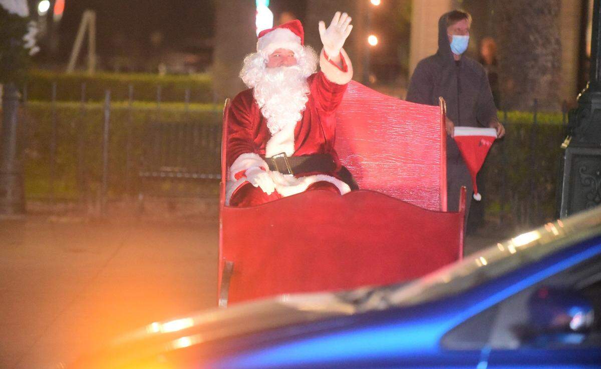 Santa Claus waves during a past year’s Merced Christmas Parade.