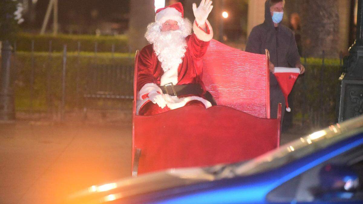 Santa Claus waves during a past year’s Merced Christmas Parade.
