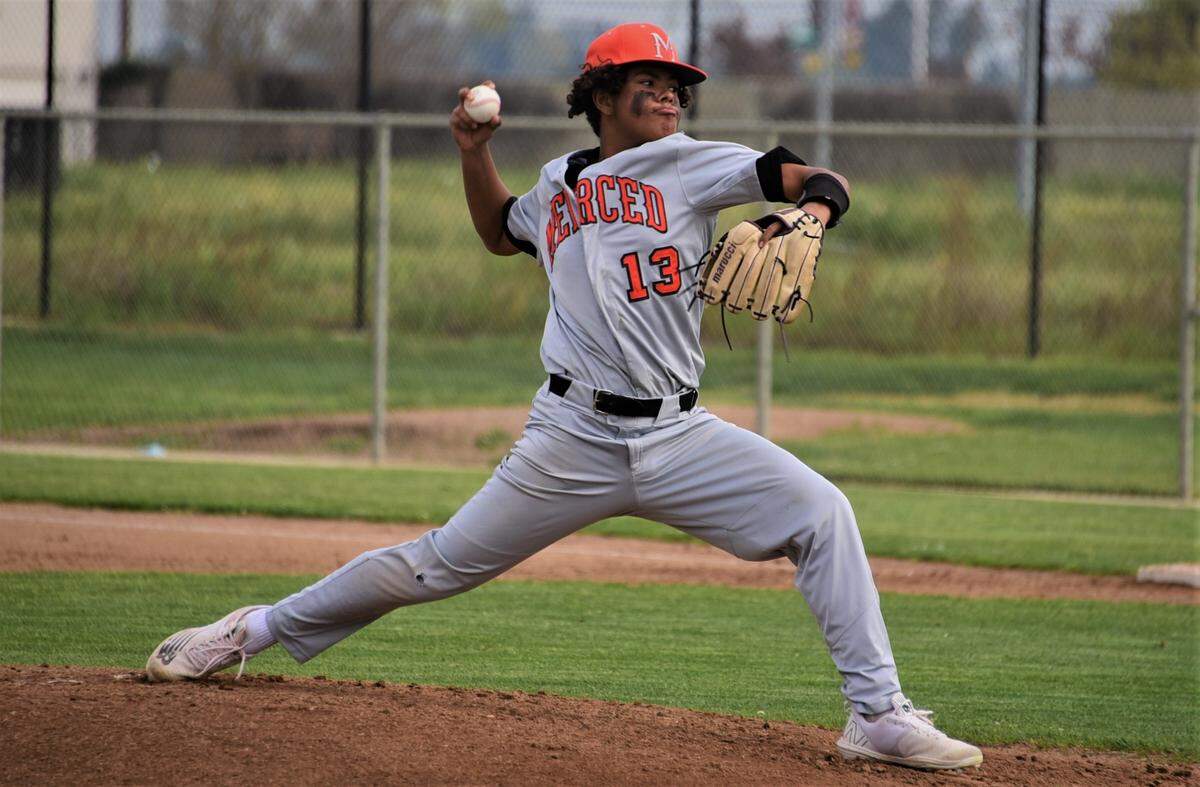 Merced High sophomore EJ Knott delivers a pitch during the first inning during a game against El Capitan on Wednesday, March 30, 2022 at El Capitan High School.