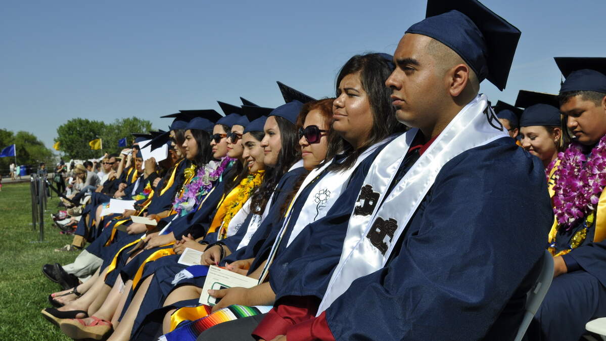 Graduates at UC Merced’s 2014 commencement are shown.