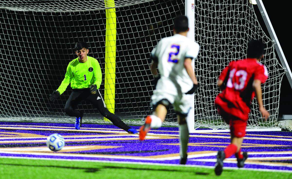 BEA AHBECK/NEWS-SENTINEL Livingston’s goalie Yareth Martinez defends during their CIF Sac-Joaquin Section Boys Division IV Soccer Championship game against Galt Thursday, Feb. 21, 2019.