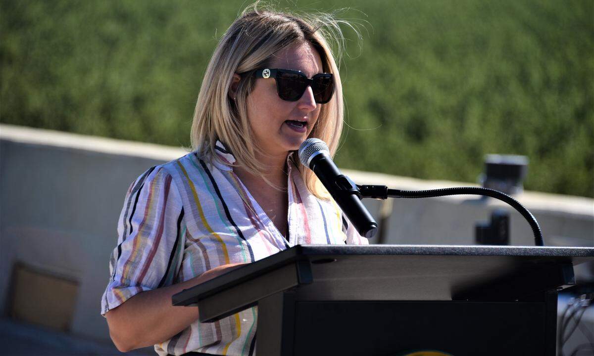 Merced City Council member Sarah Boyle speaks during the ribon-cutting ceremony of the completion of Segment III of the Campus Parkway Project on Friday, July 8, 2022.