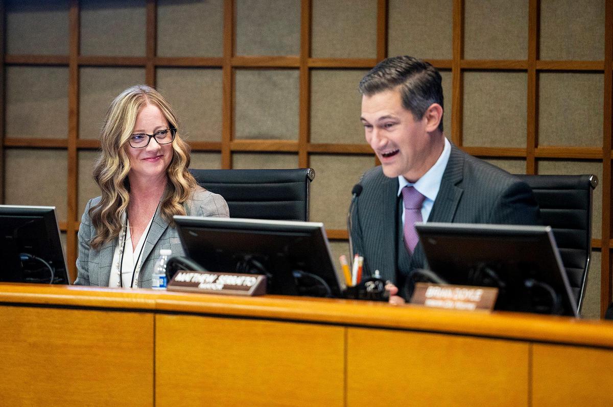 Outgoing City Manager Stephanie Dietz, left, looks to Mayor Matthew Serratto during a Merced City Council meeting in Merced, Calif., on Monday, Nov. 6, 2023. During the meeting a ceremony was held to thank Dietz for her service in the role and to swear in new City Manager Scott McBride.