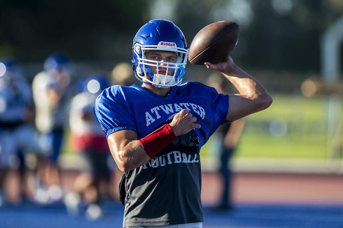 James Bell warms up during football practice at Atwater High School in Atwater, Calif., on Wednesday, Aug. 14, 2024.