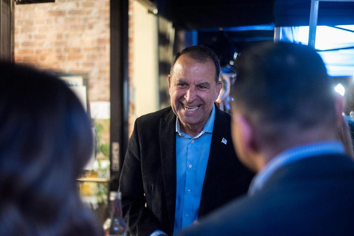 Merced County District 4 Supervisor candidate Dennis Brazil, speaks with people at an election night watch party in Merced, Calif., on Tuesday, March 5, 2024.