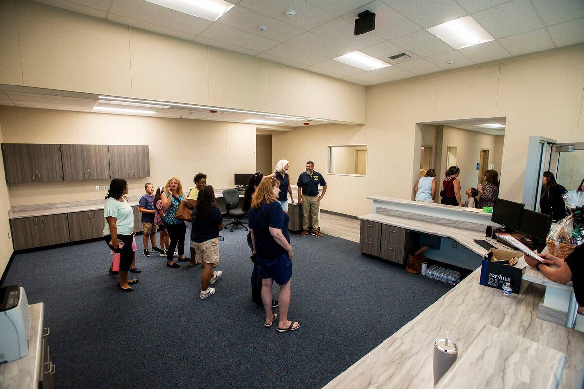 Members of the community tour the new Administrative Services Building following a a ribbon cutting ceremony to celebrate the opening of the building on the campus of Franklin Elementary School in Merced County, Calif., on Wednesday, July 24, 2024. The roughly 3,500 square foot facility is equipped to support the Franklin Elementary School staff, students and their families.