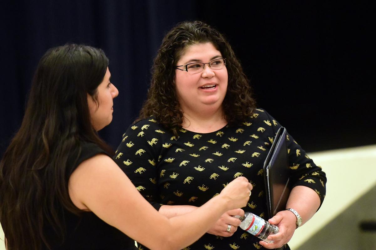 Karla Seijas, who works at UC Merced, speaks at a youth-led forum in south Merced on Wednesday, Oct. 17, 2018, where relations with law enforcement was a hot topic.