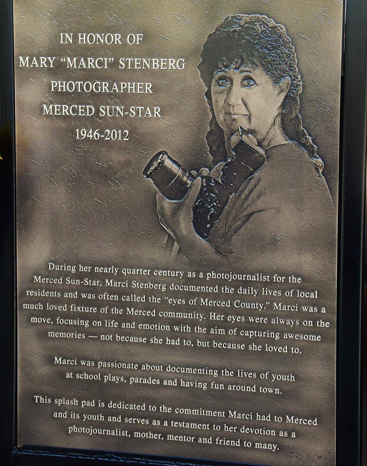 Former Merced Sun-Star photographer Marci Stenberg was honored with a plaque at the splash pad at Stephen Leonard Park in Merced on Saturday, Aug. 17, 2019.