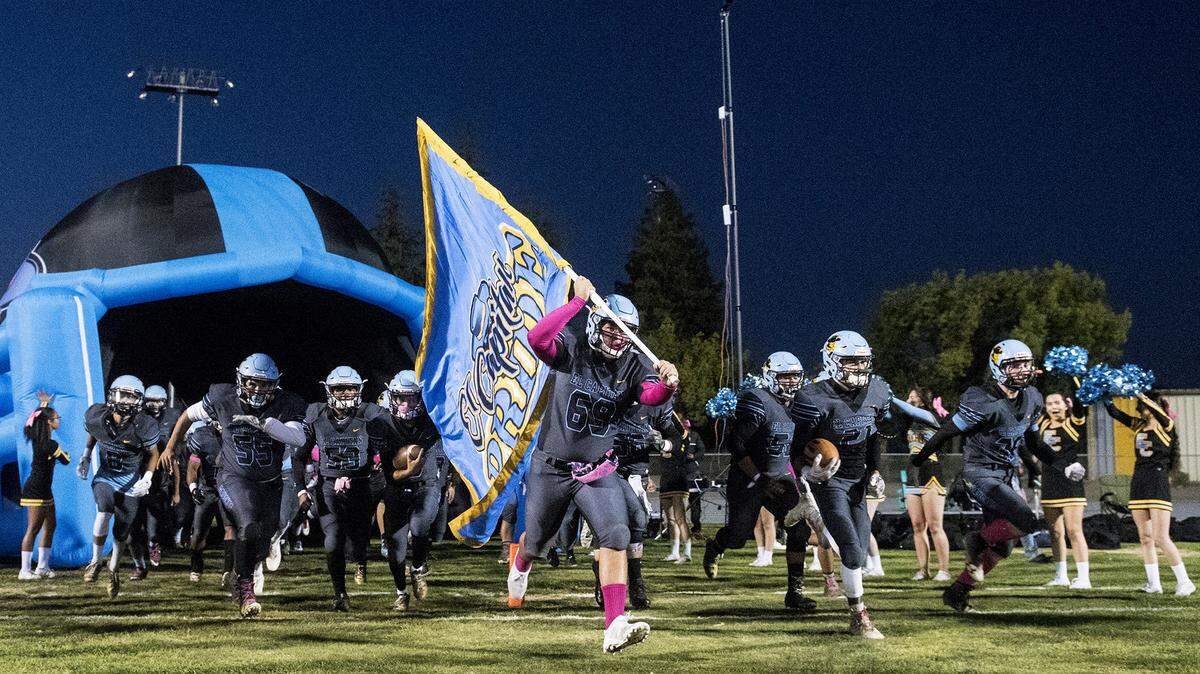 The El Capitan Gauchos take the field prior to a game  against Merced at Stadium ’76 in Merced, Calif., on Friday, Oct. 13, 2017. The Bears beat the Gauchos 56-14.
