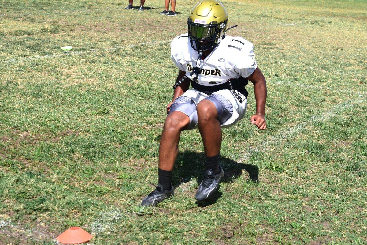 Buhach Colony High junior Isaiah Reed goes through linebacker drills during practice on Monday, Aug. 12, 2024.