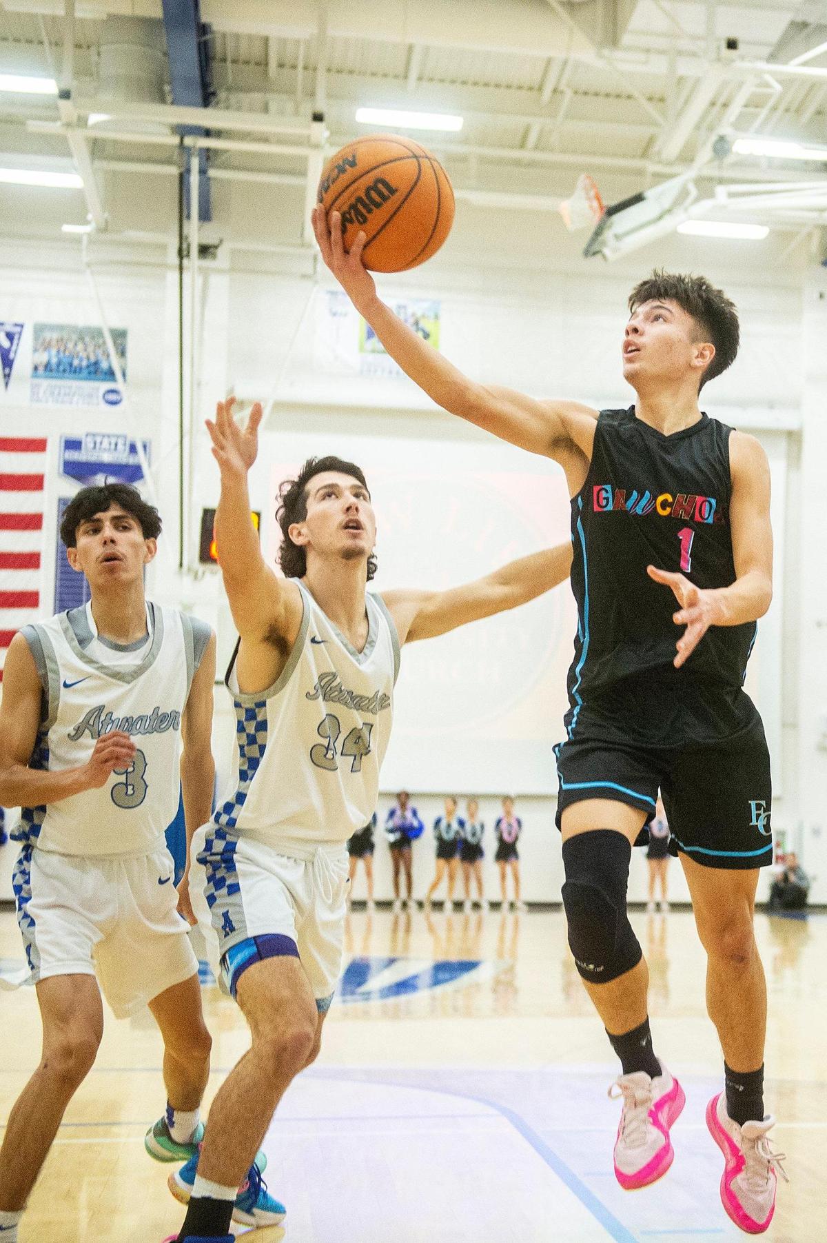 El Capitan junior Diego Ultreras (1) attempts a layup during a game against Atwater at Atwater High School in Atwater, Calif., on Wednesday, Jan 17, 2024.