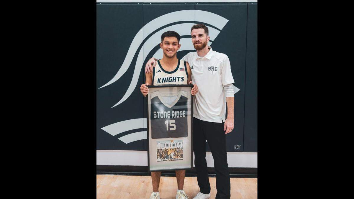 Stone Ridge Christian High School junior Kassius Salazar (left) is pictured with Knights coach Tyler Rogers after Salazar topped 1,000 career points on Monday, Dec. 4, 2023 against Modesto Christian.