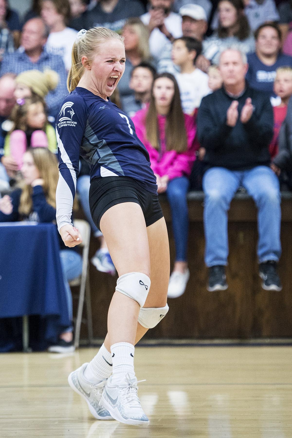 Stone Ridge Christian sophomore Sydney Shaw (7) yells as she celebrates a Knights point during a match against Forest Lake Christian in the CIF NorCal Division VI Regional Championship at First Baptists Merced in Merced, Calif., on Tuesday, Nov. 13, 2018. The Knights beat the Falcons 3-0.