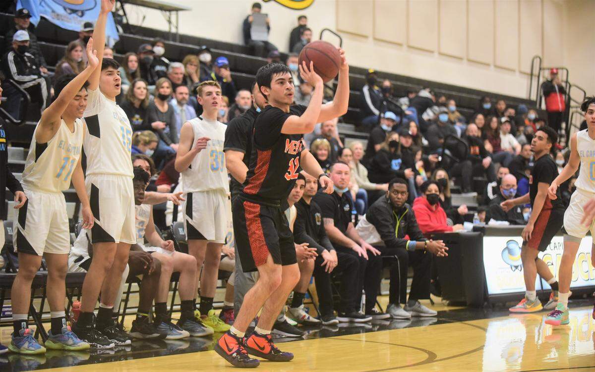 Merced High sophomore Roman Buendia fires a 3-pointer during a game at El Capitan High School on Monday, Feb. 7, 2022.