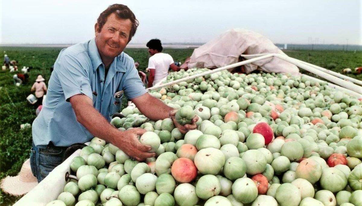 Le Grand farmer Joe Marchini is pictured with a harvest in 1975.