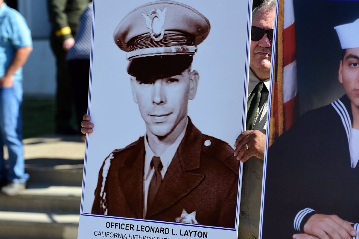 A picture of Officer Leonard Layton of the Los Banos office of California Highway Patrol stood at the Merced County Peace Officer's Memorial on Monday, May 14, 2018, during the annual ceremony to honor law enforcement officers who have died on the job. Layton was recently added to the memorial after officers found he died in a car crash while serving.