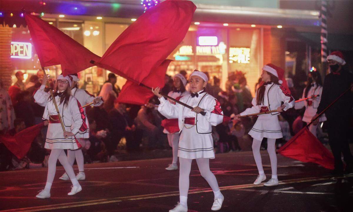 The Los Banos Junior High band and color guard performed during the Annual Los Banos Christmas Parade on Friday, Dec. 3, 2021 in Los Banos, Calif.
