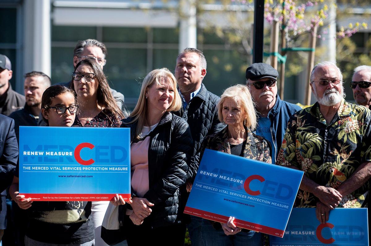 The Committee for a Safer Merced holds a kickoff rally for a petition drive to renew Measure C outside the Merced Civic Center in Merced, Calif., on Thursday, April 13, 2023. The half-cent sales tax was approved in 2006 and funds more than 30 public safety positions as well as providing resources for emergency responses and road improvements. The measure is set to expire in 2026.