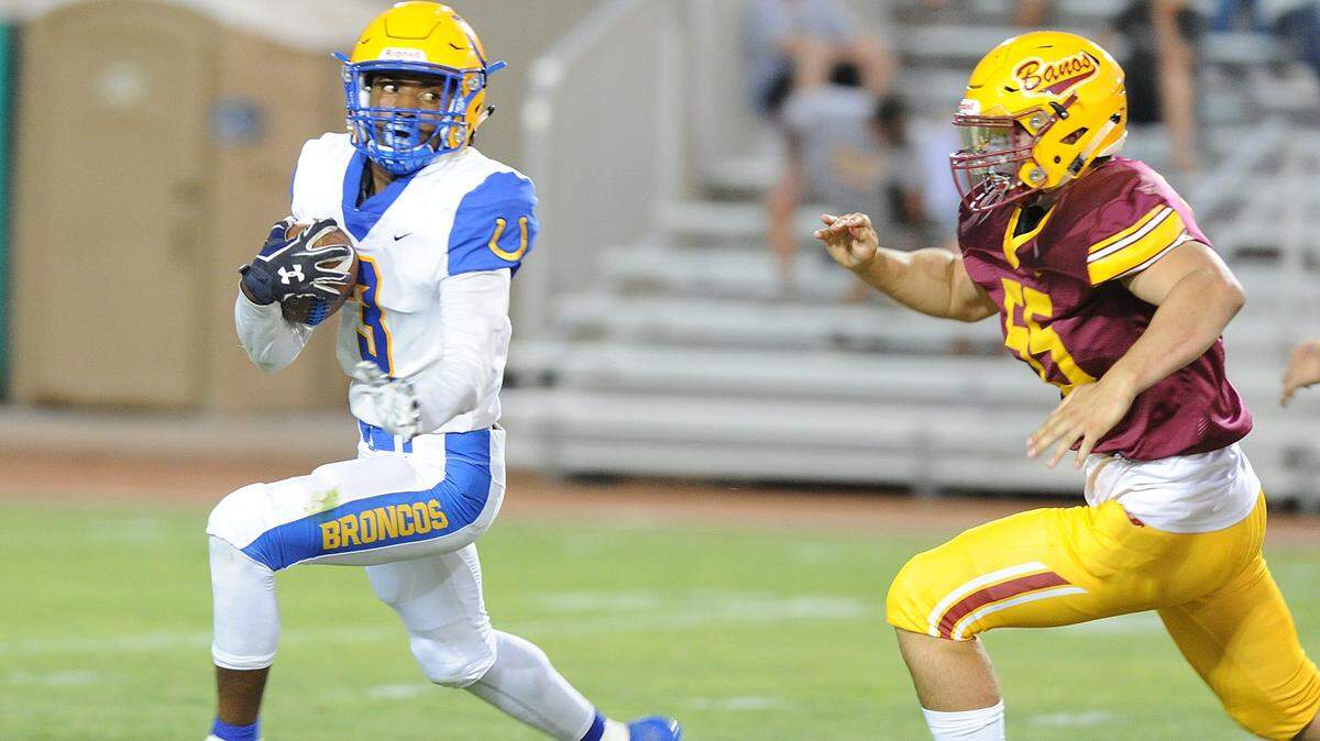 Dos Palos senior Tyree Martin (3), shown here earlier this season against Los Banos, has rushed for 1,122 yards and eight touchdowns this season.