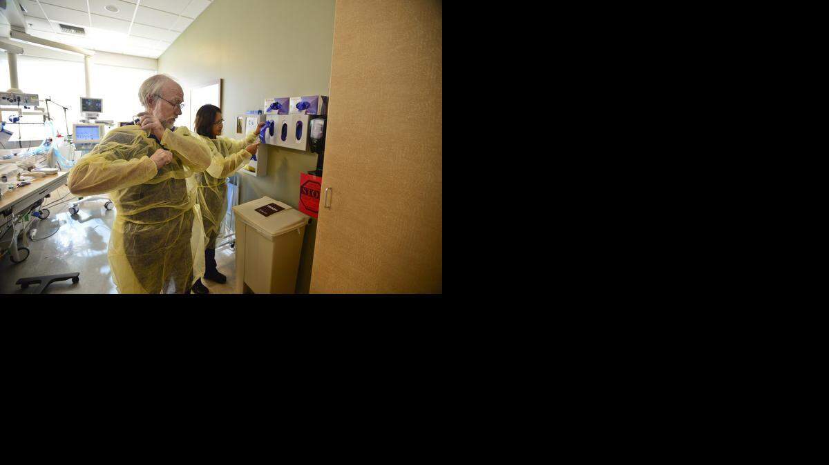 <137>Charge<137> Nurses Sal Dowhaniak, 60, left, and <137>registered nurse<137> Ofelia Aquino, 60, both of Merced, prepare to treat a patient in the Mercy Medical Center intensive care unit in Merced<137>, Calif.,<137> on Thursday<137>, Dec. 25, 2014<137>. The two <137>have been working together for over 30 years and<137> agree that being selfless and watching out for others is part of being a nurse<137> morning with their children<137>.