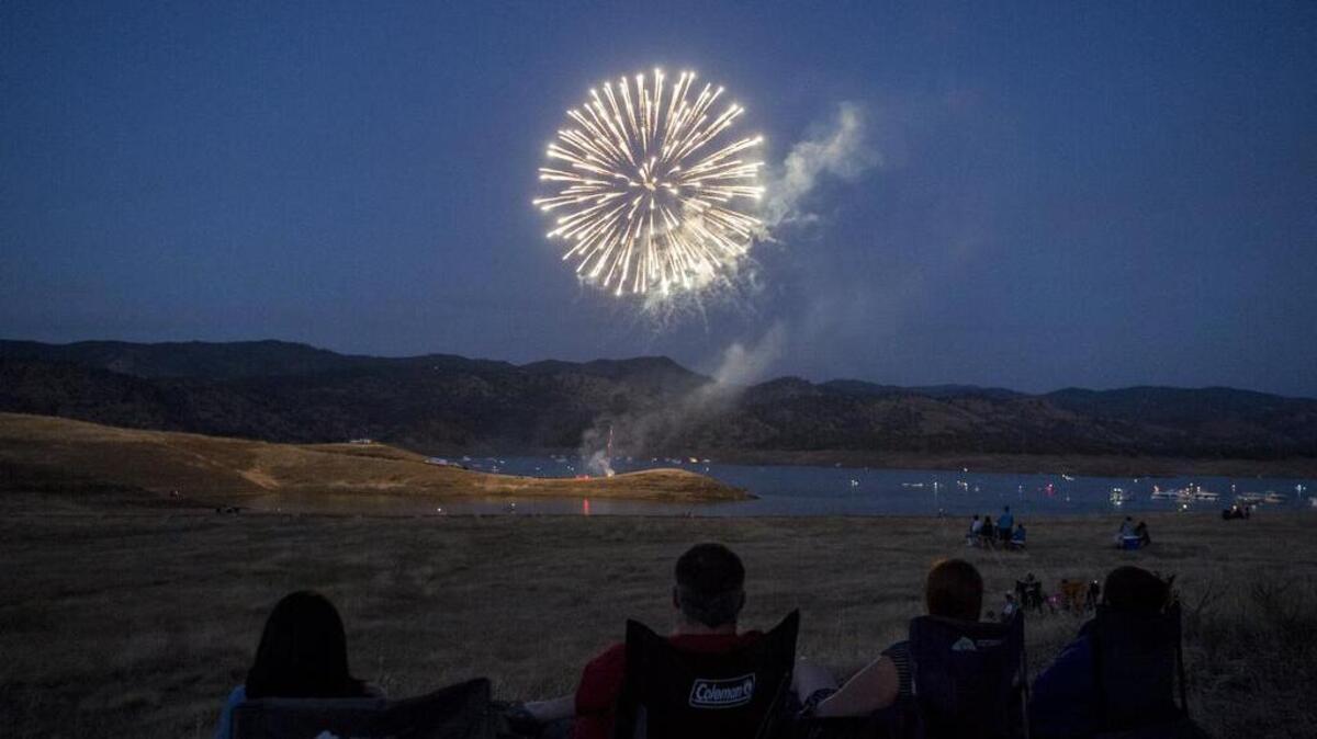 Fireworks explode during Lights on the Lake Fireworks at Lake McClure in Snelling, Calif., Saturday, July 2, 2016.