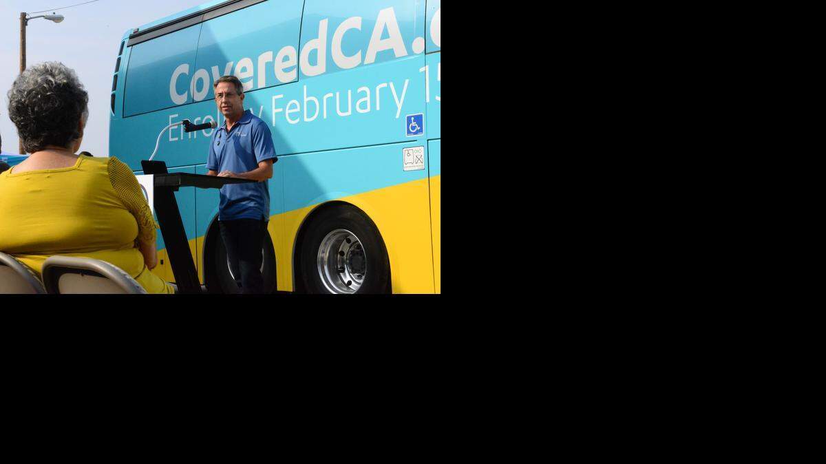 
Covered California Executive Director Peter V. Lee stops by Healthy House in Merced on Tuesday as part of a nine-day, 21-city tour to promote open enrollment, which starts Saturday. 
