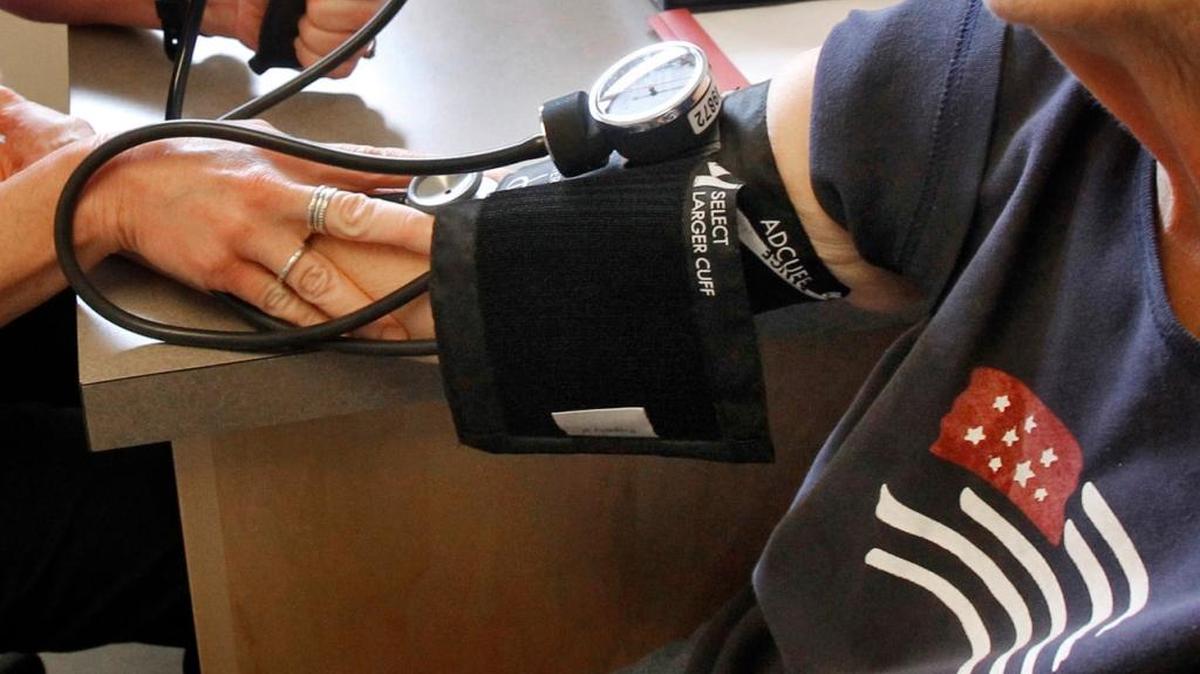 A patient has her blood pressure checked by a registered nurse in Plainfield, Vt. Thursday, June 6, 2013. (AP Photo/Toby Talbot, File)