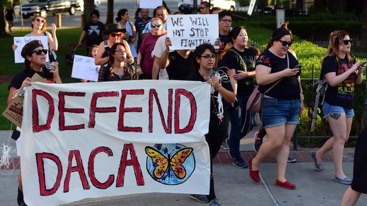 Supporters of the Deferred Action for Childhood Arrivals initiative march in protest on Tuesday, Sept. 5, 2017, of the White House's plan to win down the program. The initiative allows young undocumented immigrants to be shielded from deportation.